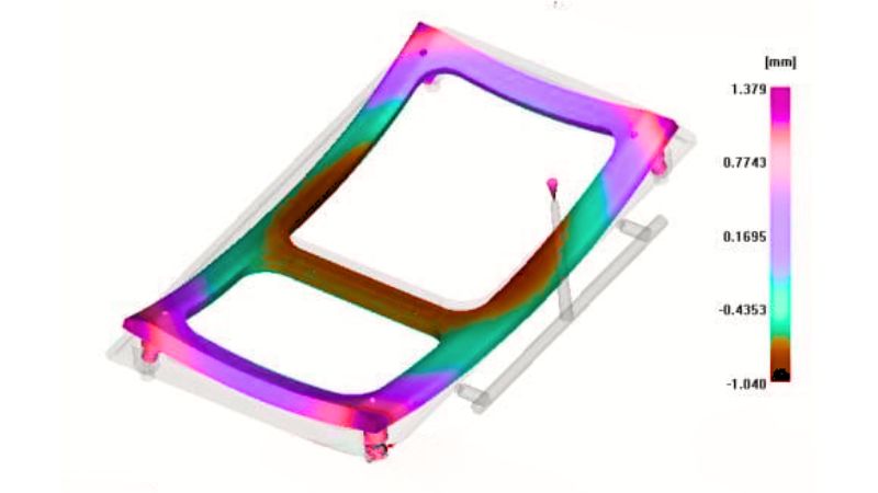 Análisis de tensión codificado por colores de un componente mecánico, que muestra la distribución de tensión de -1,49 mm a 1,179 mm.