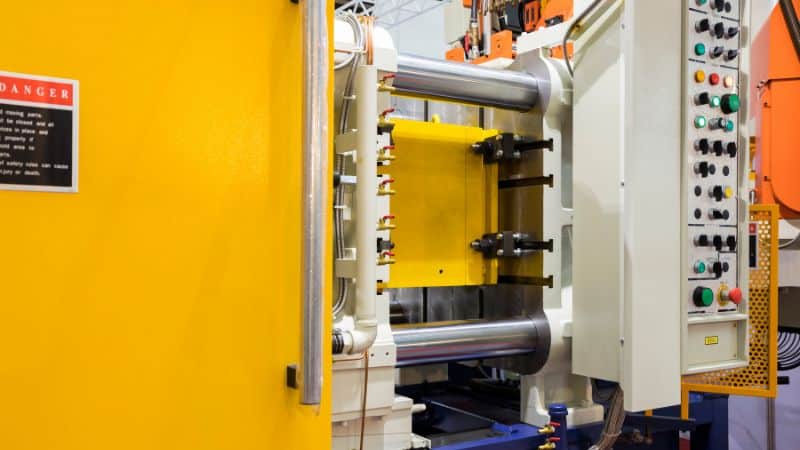 a yellow high pressure die casting machine