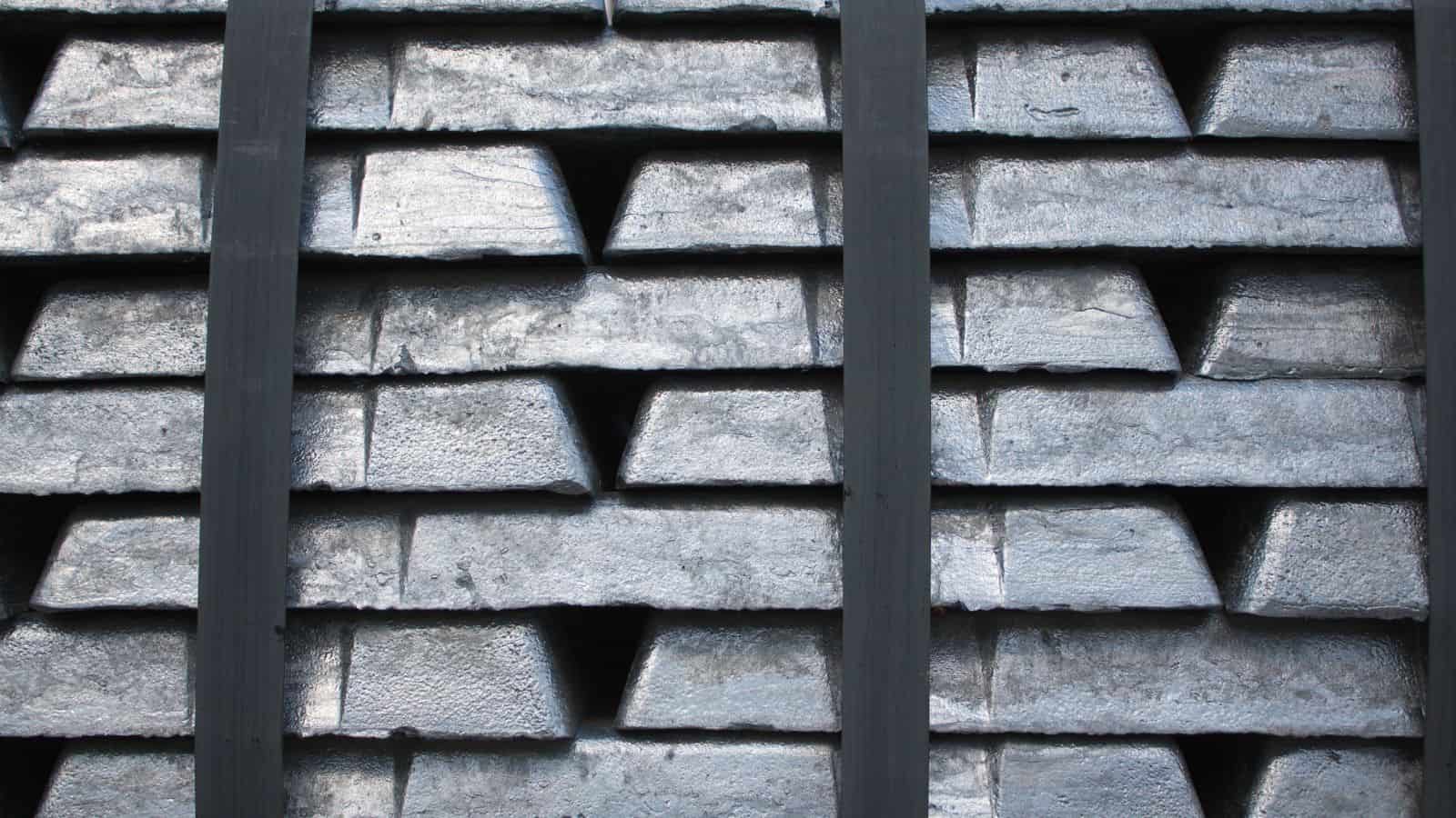 the close up photo of a stack of Zamak ingots