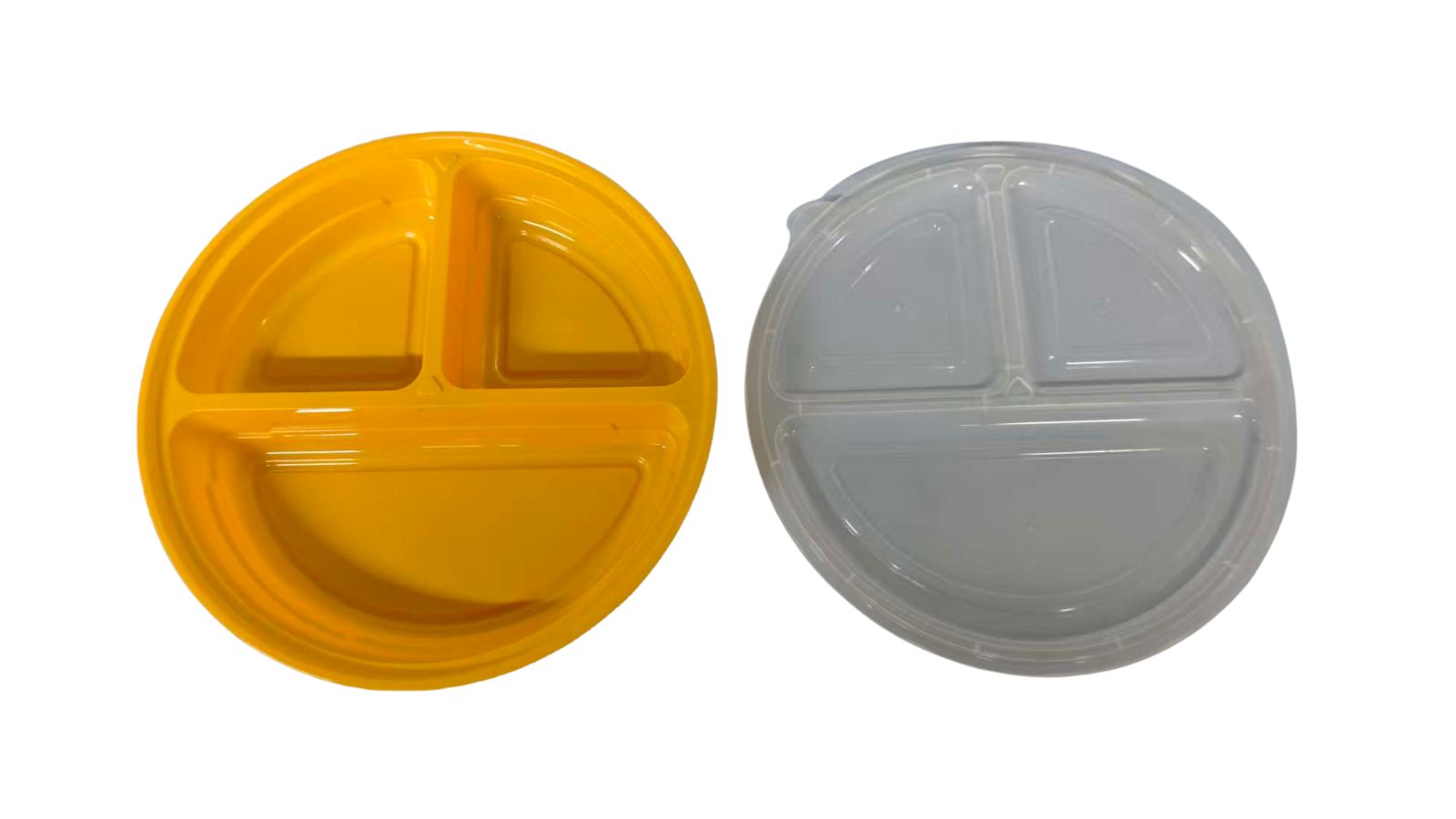 Two round plastic food containers with divided compartments, one yellow and one clear, showcasing injection molding technology for durable packaging solutions.