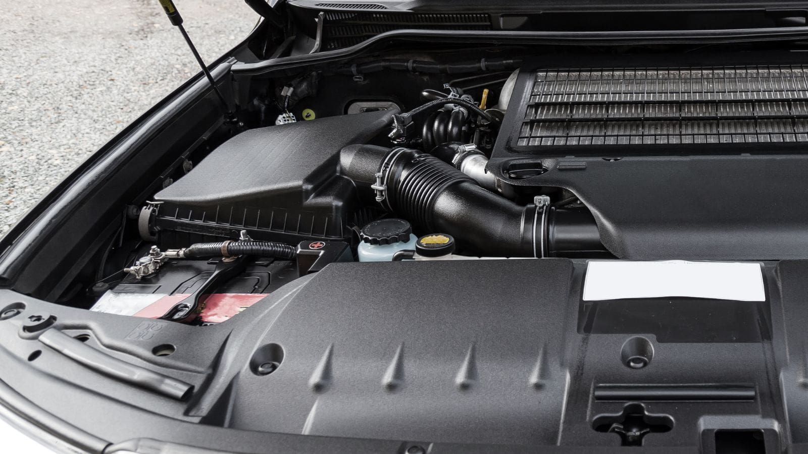 the front engine compartment with plastic housings, frames and components