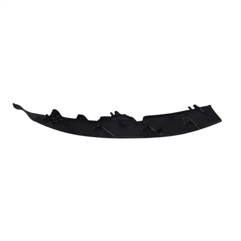 a black plastic headlight component