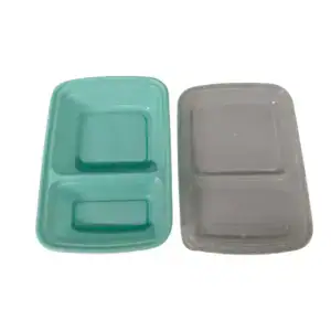 Food storage containers with two compartments, one teal and one gray, ideal for meal prep and organization.