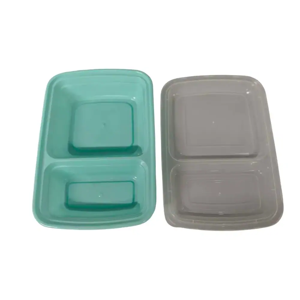 Food storage containers with two compartments, one teal and one gray, ideal for meal prep and organization.