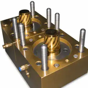 High-precision airline cup mold with metallic components and multiple pins for plastic injection molding process.