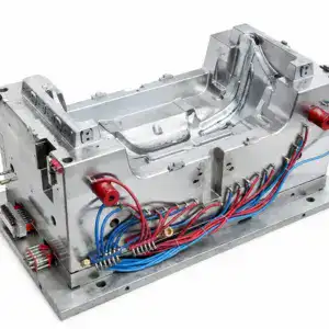Precision dual-cavity automotive bumper injection mold with detailed metal components and wiring for manufacturing.