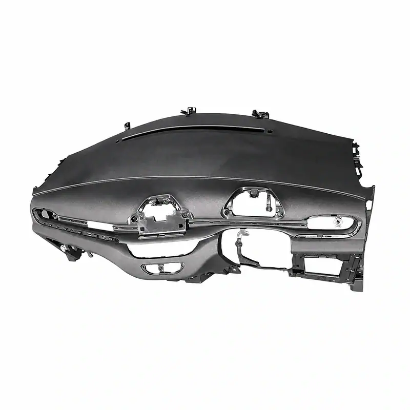Automotive dashboard frame for vehicle repair, black plastic with mounting points and cutouts for instruments and controls.