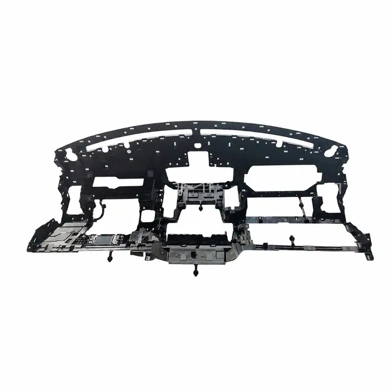 Injection mold for car dashboard structural component, showcasing detailed plastic framework used in automotive manufacturing.