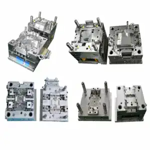 Collection of automotive dashboard instrument cluster injection molds in various shapes and sizes for manufacturing.
