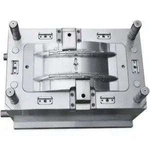 High-precision metal mold used in manufacturing processes, featuring detailed cavities and alignment pins for accurate production.