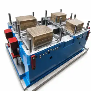 High-precision industrial mold making machine with multiple molds and metallic components for manufacturing processes.