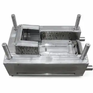Stainless steel industrial mold with four cylindrical support pillars and detailed internal cavity for manufacturing processes.
