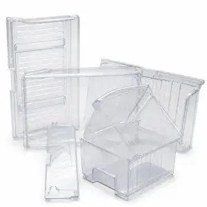 Set of transparent refrigerator drawer and ribbed panel molds for custom appliance parts.