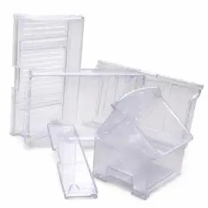 Set of transparent plastic storage containers with various sizes and compartments for organizing household items or office supplies.