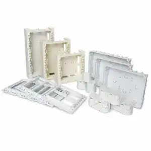 Set of white electrical boxes and covers for refrigerator, including various sizes and shapes, used for electrical wiring and protection.