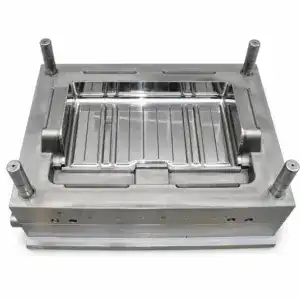 Stainless steel industrial mold with four guiding pins, used for precision manufacturing and casting processes.